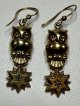 星をつかんだフクロウのゴールドピアス1920年イギリス